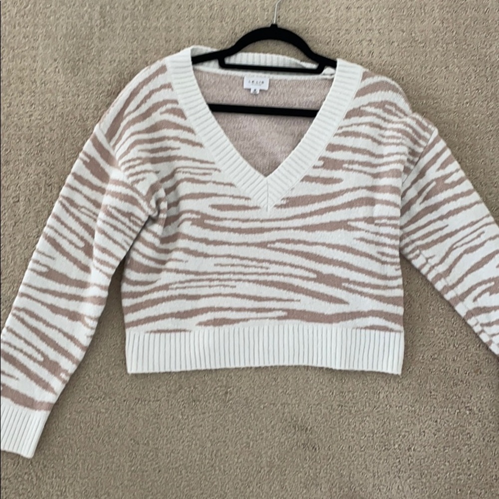 Beige and white sweater